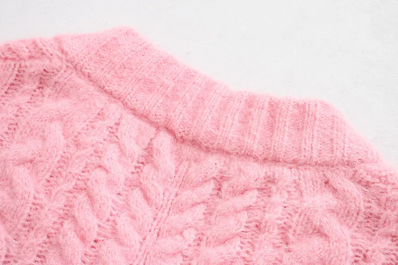 CABLE-KNIT SWEATER